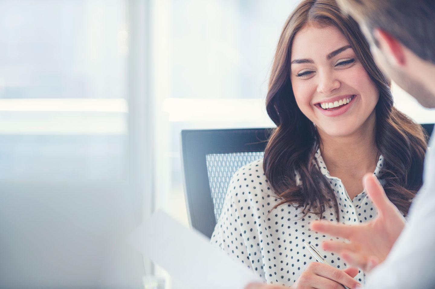 Woman smiling in the office