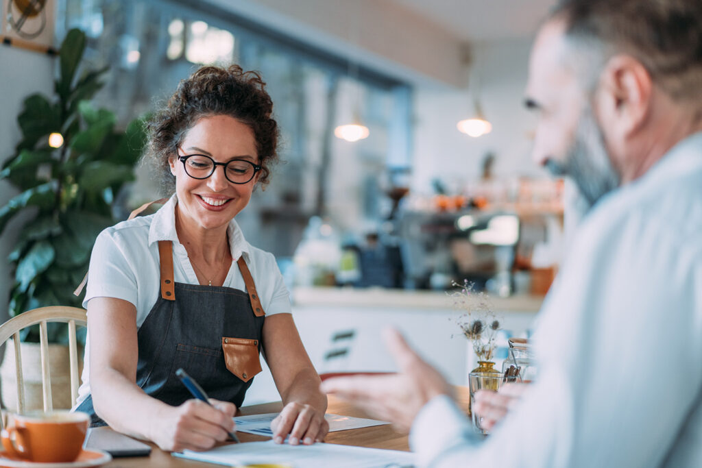 Woman budgeting for her small business